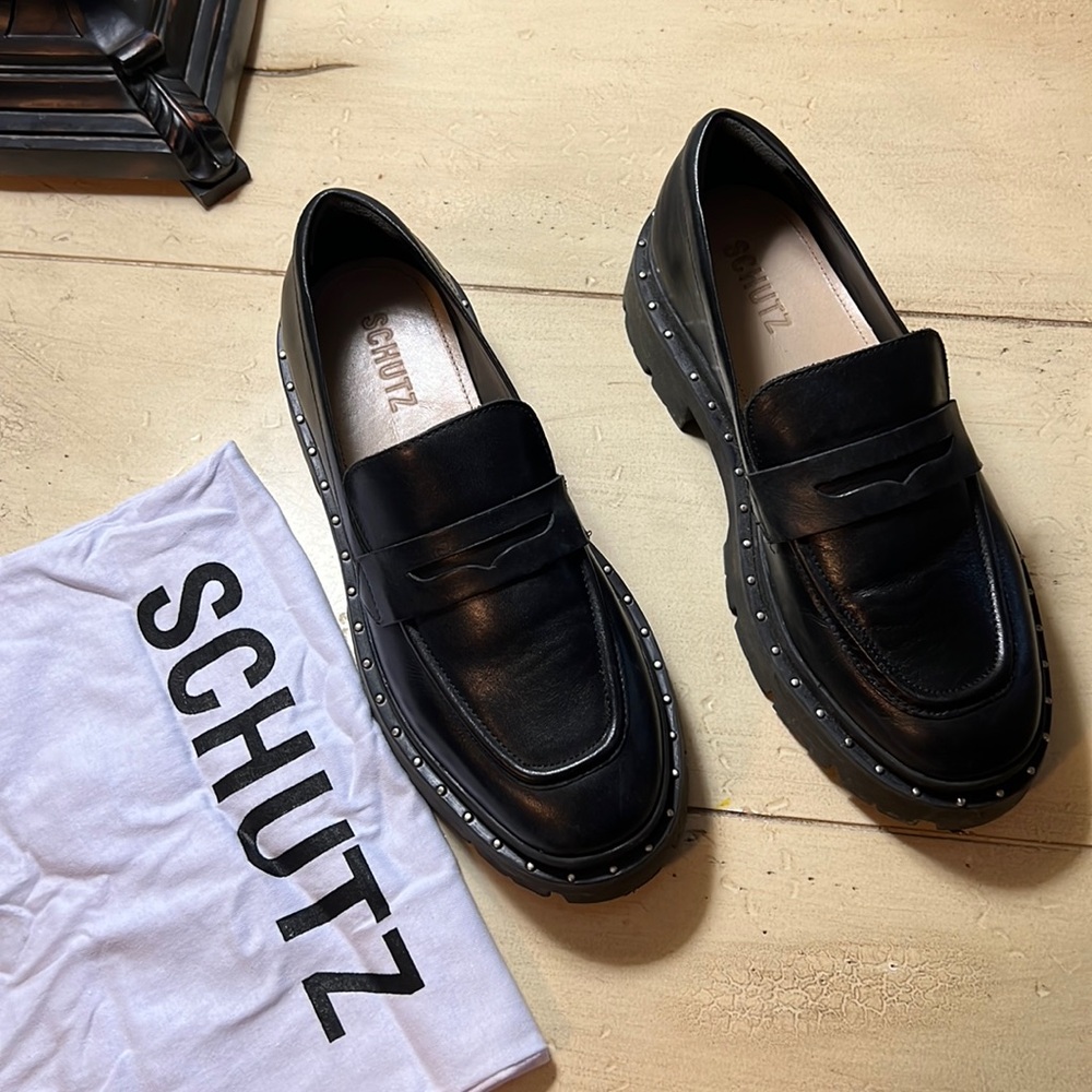 Black leather platform loafers